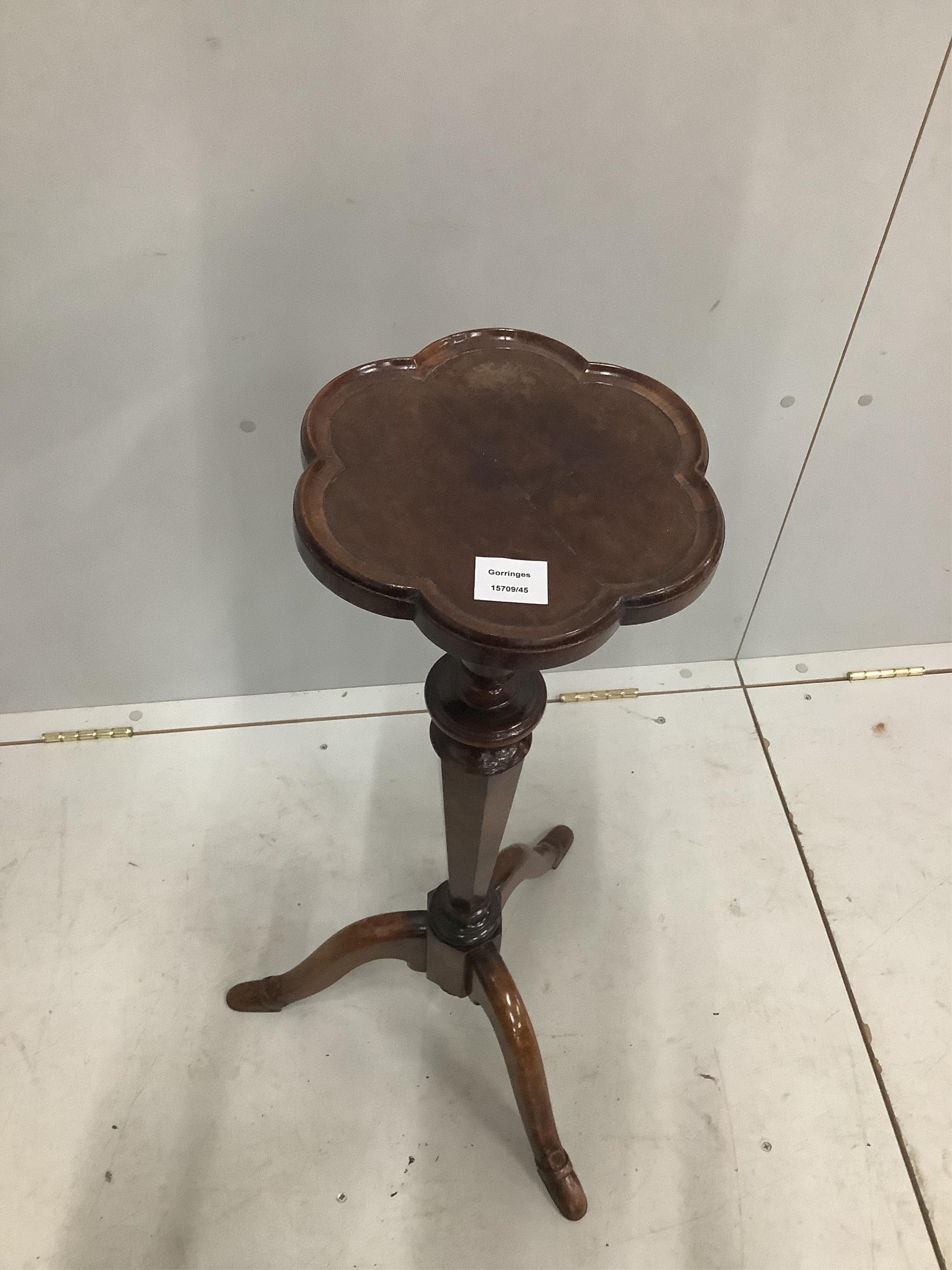 A rare early 18th century maple and burr maple veneered torchere stand, the tripod base with unusual shoe shaped feet, height 80cm. Condition - fair to good